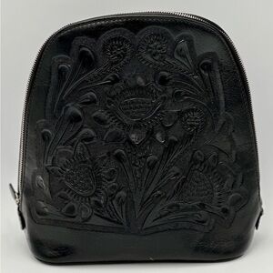 Hand tooled leather backpack